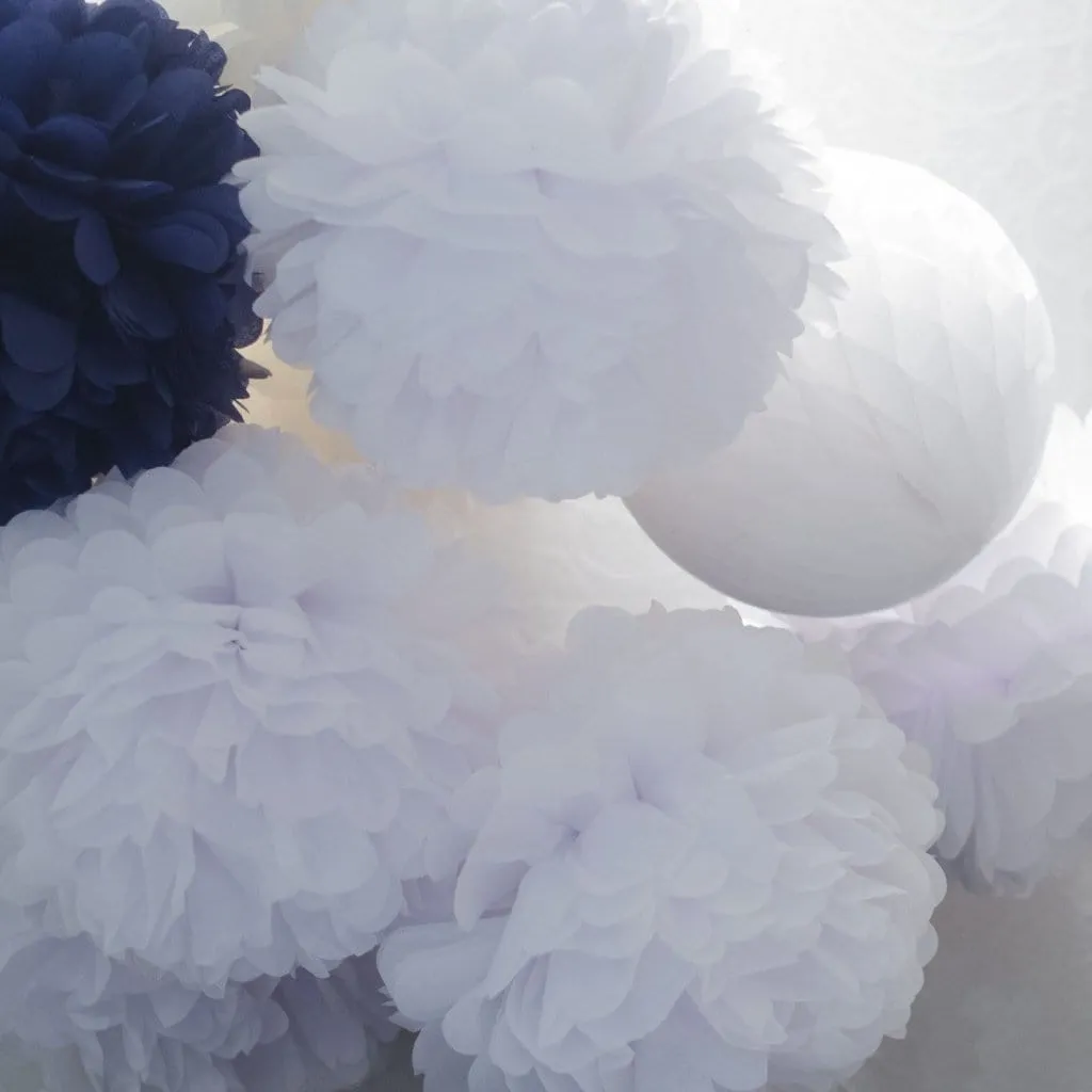 White tissue paper pom pom party decoration