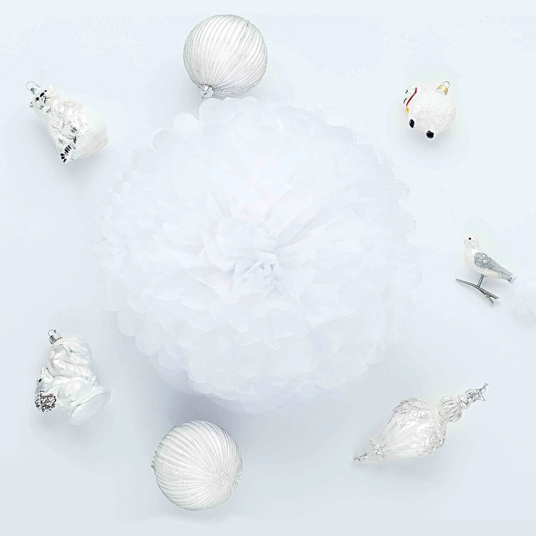 White tissue paper pom pom party decoration